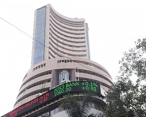 Sensex jumps 450 points, rupee gains 74 paise