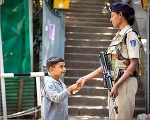 Adorable photo of Kashmiri child shaking hands with CRPF personnel wins hearts