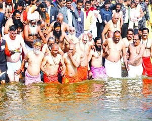 After holy dip at Kumbh, Yogi gifts UP world longest e-way
