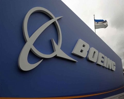 Boeing unveils a new 737 MAX even as grounding drags on