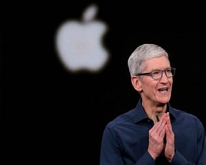 Cook takes a dig at Facebook, says no to Apple digital coin