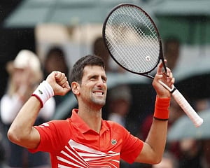 Djokovic sets Roland Garros last-eight record as Halep wins in 45 minutes