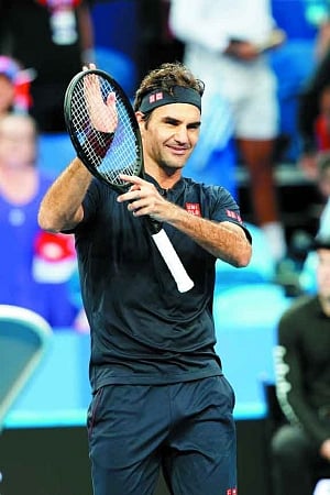 Federer takes Swiss in Hopman final