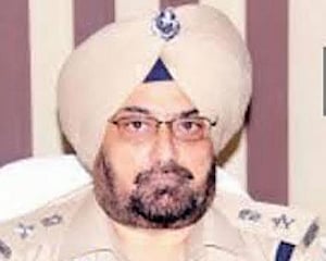 Former SSP Charanjit Sharma arrested in Behbal Kalan firing case