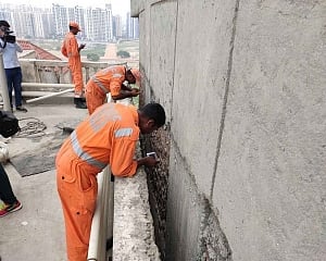 Girl's body found stuck in between two highrises in Noida