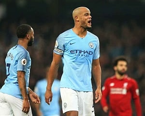 Goal hero Kompany makes good on promise as Man City go top again