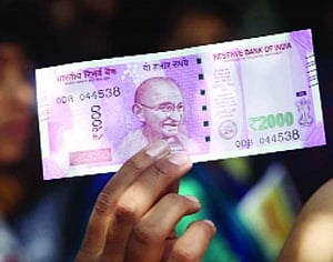 Govt indicates printing of Rs 2,000 note stopped for now