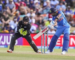 Half centuries from Rohit, Dhawan power India to challenging 324/4 against NZ