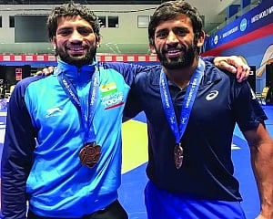 Hat-trick of medals