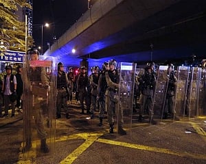 Hong Kong protesters egg China office at end of massive rally
