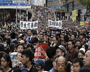 Hong Kong protesters march on station to 'educate' Chinese mainlanders