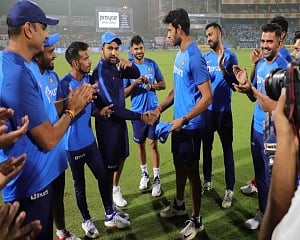 India put in to bat, Dube makes debut