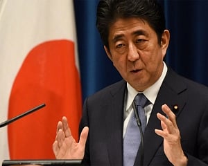 Japan's Abe backs Trump after Kim summit ends with no deal