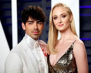 Joe Jonas rings in 30th birthday with Bond theme party