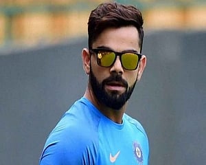Kohli fined Rs 500 for washing car with drinking water