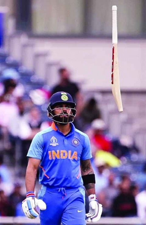Kohli goes out with pride & poise