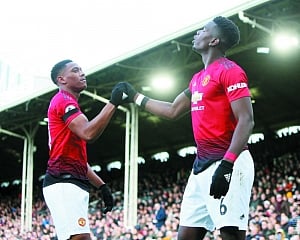 Liverpool regain title lead