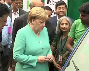 Merkel visits Delhi metro station, fitted with Germany-funded solar panel
