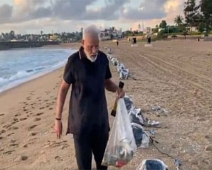 PM Modi's 'plogging' on Mamallapuram beach