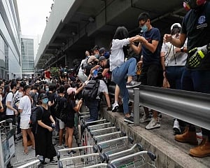 Protesters block roads near Hong Kong airport