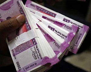 Rupee ends flat at 71.56 per dollar ahead of RBI policy decision