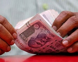 Rupee opens 18 paise lower at 70.18 against US dollar