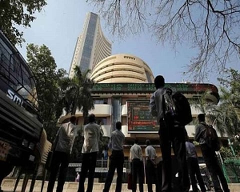 Sensex rises over 100 pts; Tata Motors rallies 13 pc