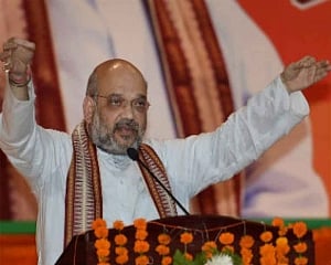 Shah questions Congress record on tribal welfare
