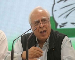 Show '56 inch' chest, tell Xi to vacate PoK land: Sibal to PM Modi