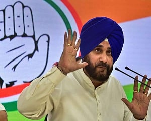 Sidhu calls BJP 'Kale Angrez', Patra hits back