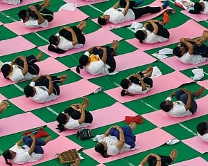 Texans ready to bend & twist on International Yoga Day