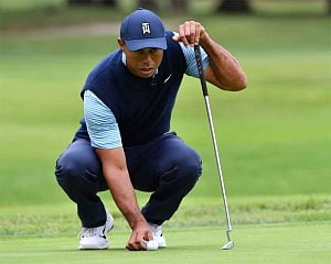 Tiger Woods shares lead as weather delays new Japan US PGA Tour event