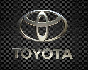 Toyota nine-month net profit dives 30%, cuts forecast