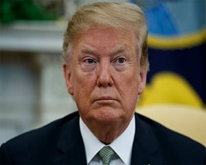 Trump warns of 'overwhelming' retaliation to any Iranian attack