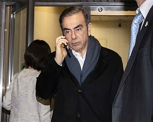 Wife of ex-Nissan chair says she 'felt in danger' in Japan
