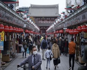 China reports 2 virus cases after mass testing
