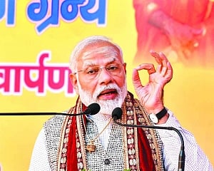 Firm on Art 370, CAA despite pressure: PM