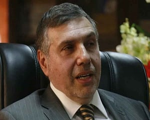 Iraqi president names new PM, dividing protesters