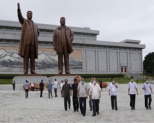 North Korea's Kim marks war anniversary amid virus concerns