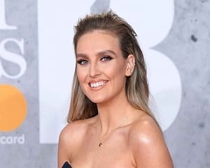 Perrie Edwards goes make-up free during outing to vets