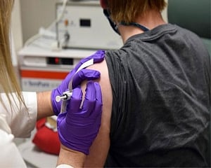 Pfizer says early data signals COVID-19 vaccine is effective