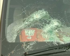 Stones hurled at J P Nadda's convoy, Vijayvargiya's vehicle ransacked