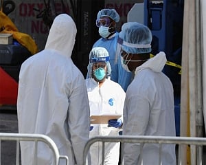 The Latest: Russia sees more than 9,000 new cases in a day