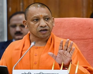Yogi takes U-turn, gives up on permission issue for migrants