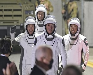 Astronauts arrive at pad for SpaceX flight on used rocket