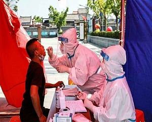 China seeks to control COVID-19 flare-up