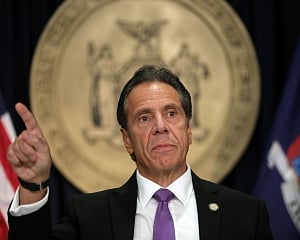 Cuomo defiant as top New York lawmakers call on him to quit
