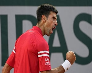 Djokovic rallies for his 2nd French Open title