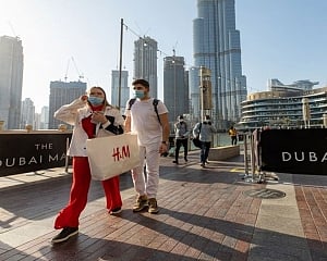 Dubai closes bars, limits activities after virus cases spike