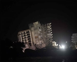 Explosives set off to bring down rest of collapsed condo